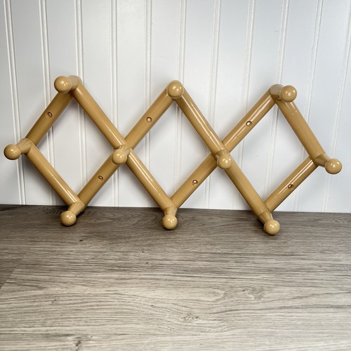 Vintage plastic accordion rack - plastic,